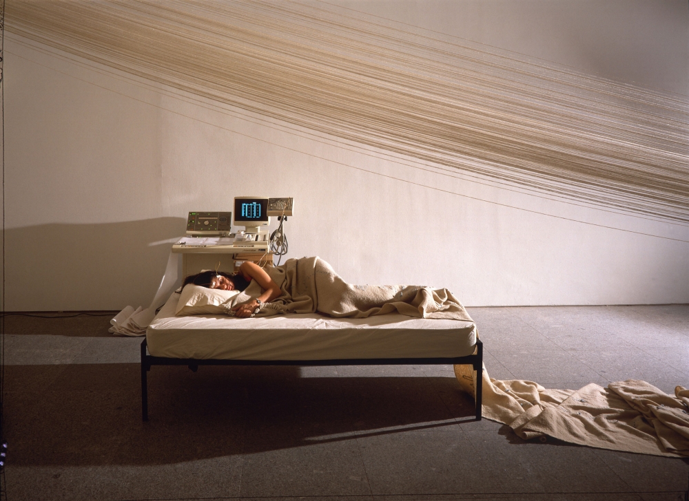 Janine Antoni, Slumber, 1993, Performance with loom, yarn, bed, nightgown, polysomnogram machine and artist&rsquo;s REM reading, Dimensions variable