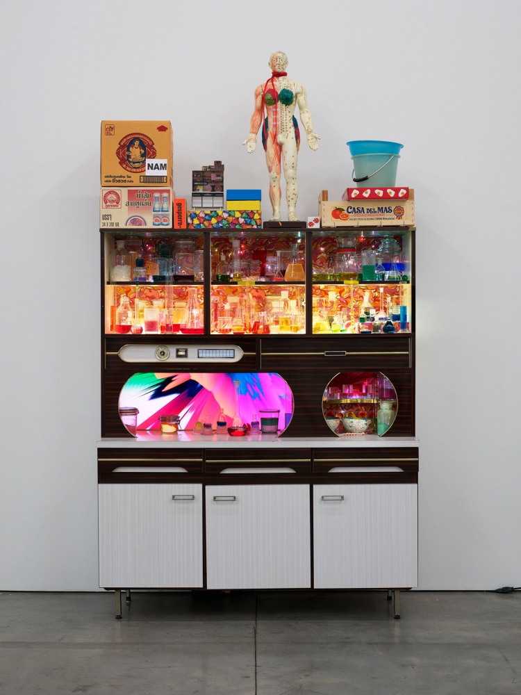 Pipilotti Rist
Tosender Speicher (Thunderous Accumulator), 2013
Video installation; 1 LCD monitor, 1 flashcardplayer, 1 vintage sideboard in laminated wood, miscellaneous objects, LED lights, laboratory glassware with synthetic resin
108 5/8 x 59 x 22 7/8 inches
(276 x 150&amp;nbsp;x 58&amp;nbsp;cm)