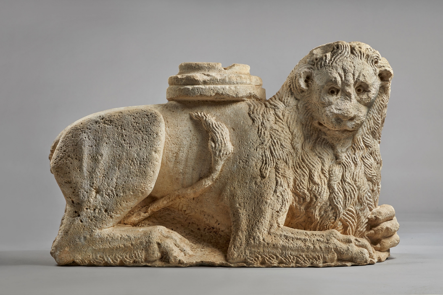 Two monumental lions with carving on reverse from a 2nd century Roman triumphal arch, c. 1200- 1250
Central Italy
Metamorphic limestone; originally from the entrance to a church
Lion with carving on reverse: 22.8 x 36 x 11.8 inches (58 x 92 x 30 cm)
Lion with uncarved reverse: 23.5 x 33.5 x 11.4 inches (60 x 85 x 29 cm)