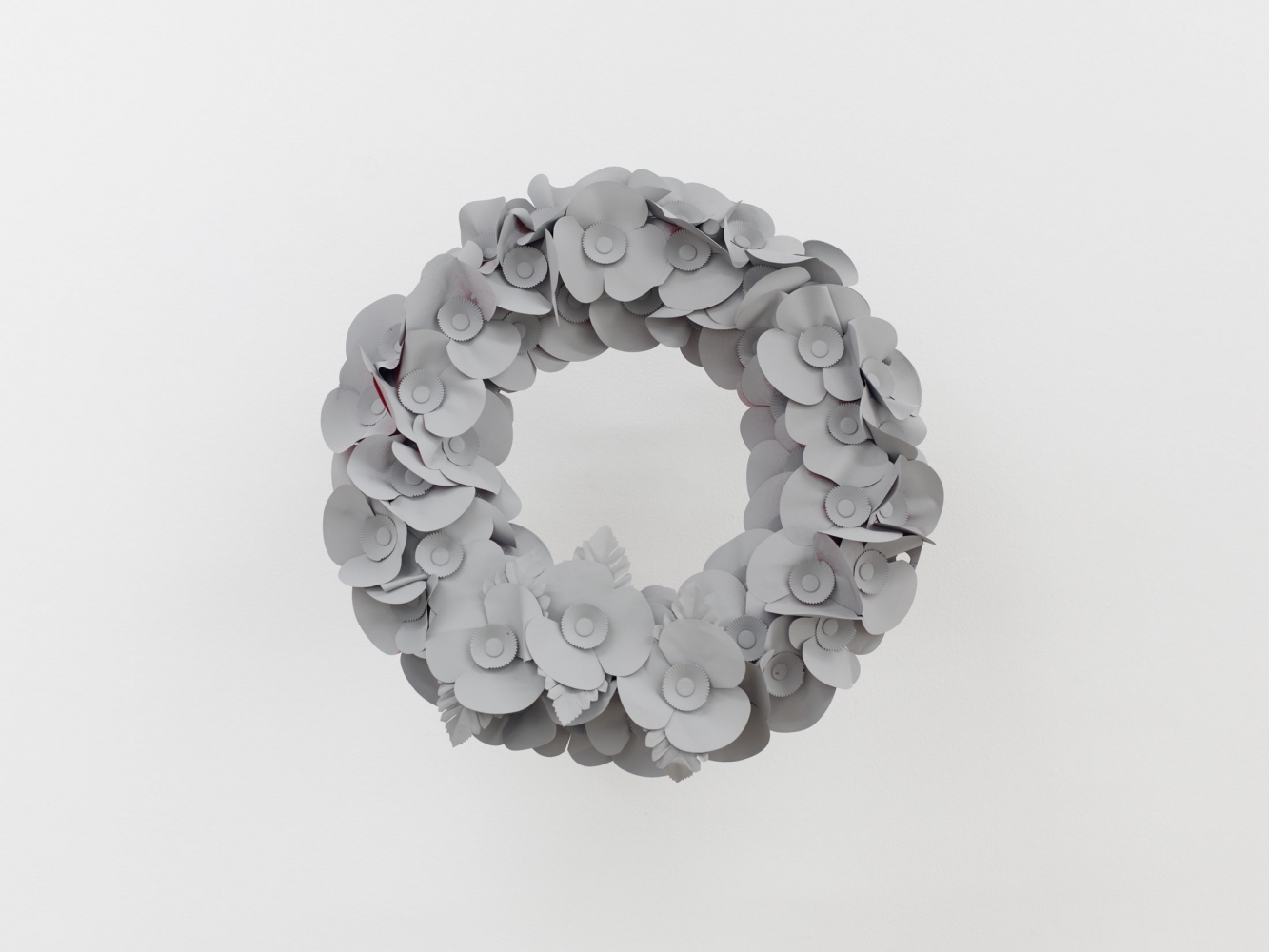 Camilla Wills
Anti-imperial Monochromes, 2021
Five Royal British Legion poppy wreaths, signal grey paint
Each: 15 3/4 x 15 3/4 x 12 5/8 inches (40 x 40 x 32 cm)
&amp;copy; Camilla Wills; Courtesy of the artist, d&amp;eacute;pendance, Brussels, and Luhring Augustine, New York.
Photo&amp;nbsp;by Kristien Daem.