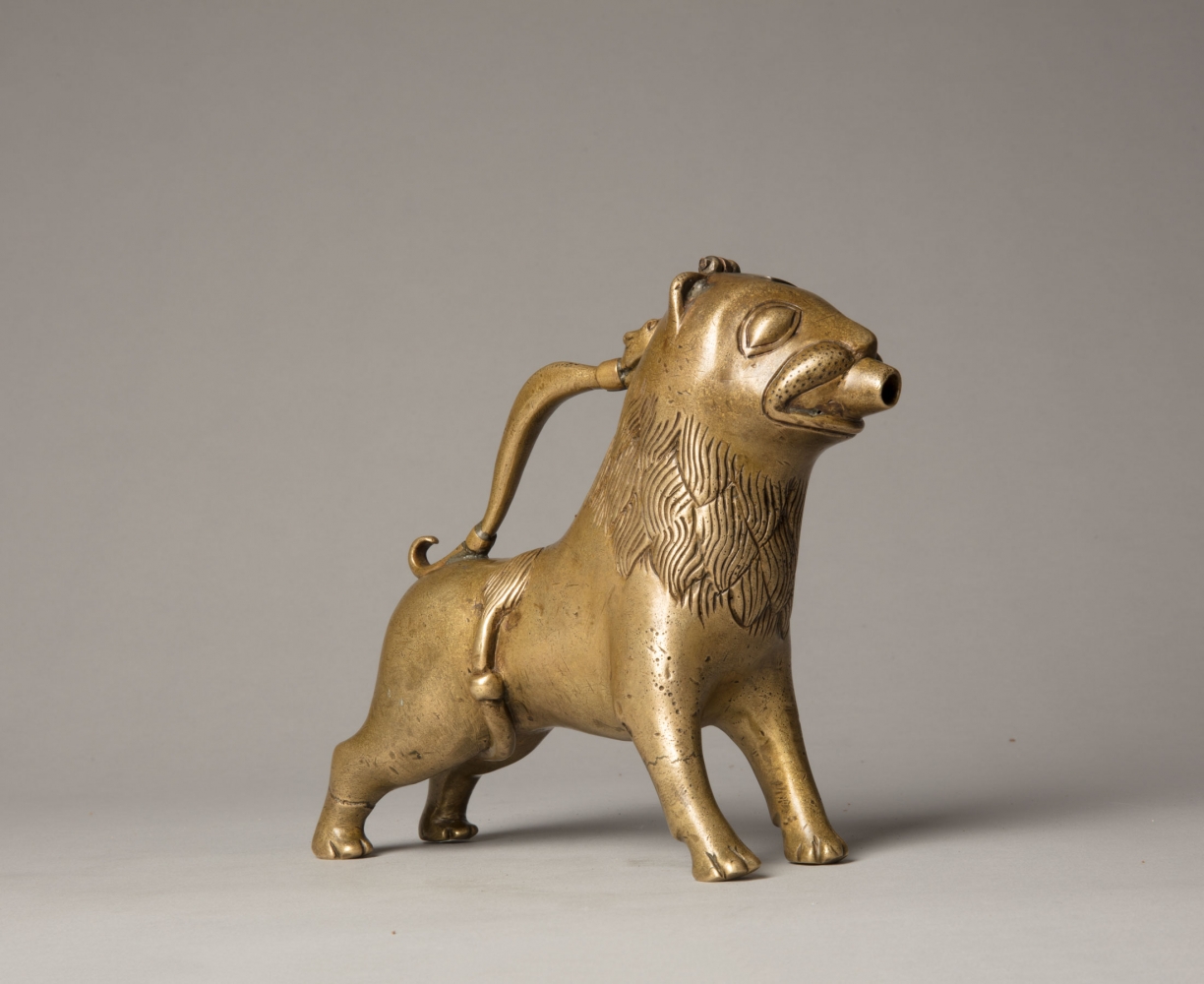 An aquamanile in the form of a lion, Early 13th century
