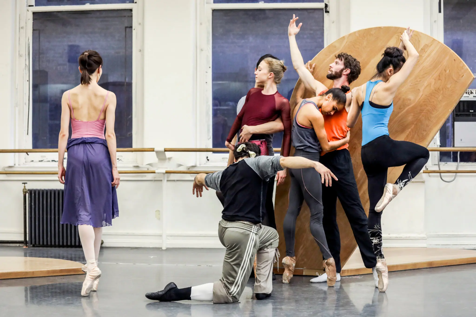 a group of ballet dancers in rehearsal