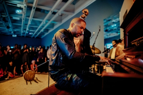 Jason Moran performing with his trio, the Bandwagon, at the Whitney Museum of American Art.Credit...Sasha Arutyunova for The New York Times