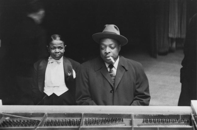 Lee Friedlander
Pee Wee Marquette and Count Basie, 1957&amp;nbsp;
Gelatin silver print
Image: 8 x 12 inches (20.3 x 30.5 cm)
Sheet: 11 x 14 in (27.9 x 35.6 cm)
&amp;nbsp;