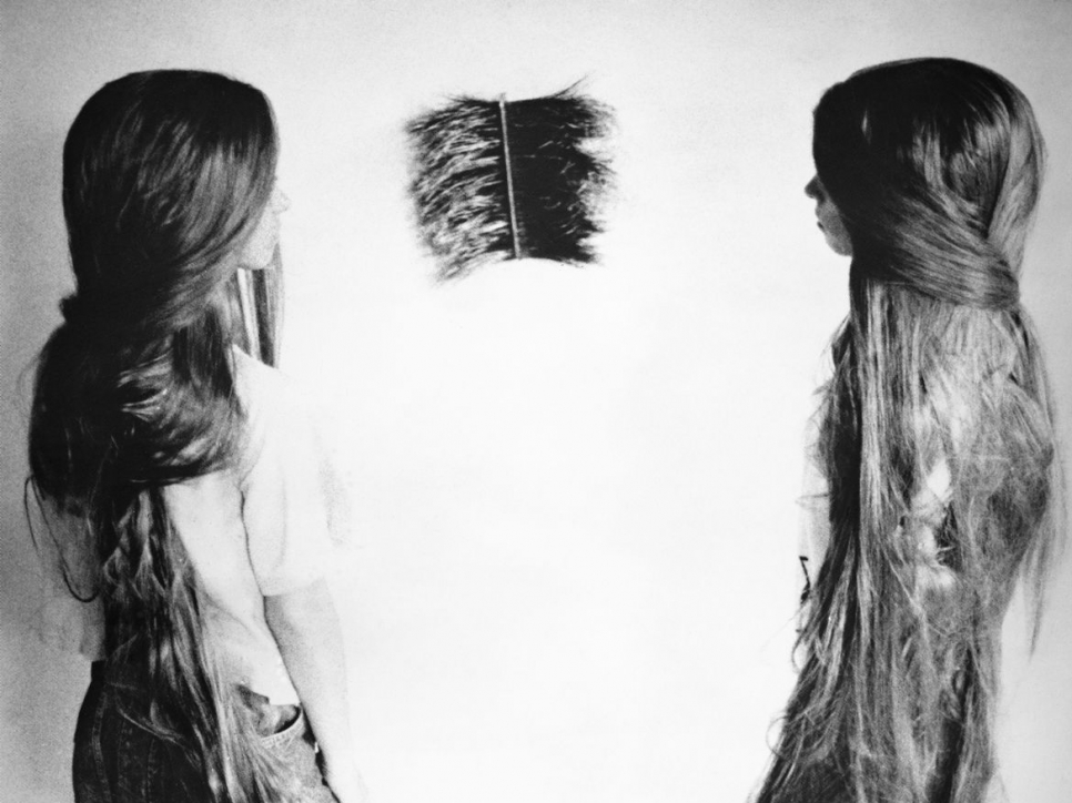 2 girls with long hair