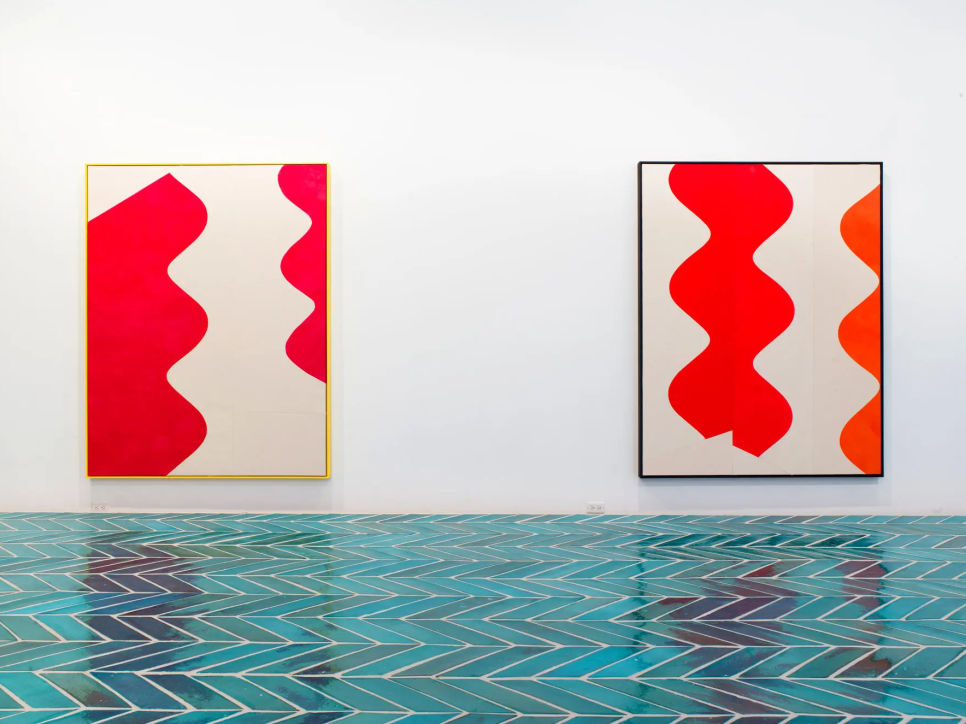 2 paintings in a gallery space with turquoise tiled floor